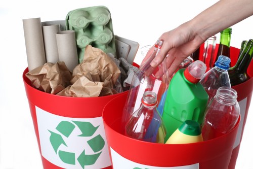 Clearance team organizing items for recycling and donation.